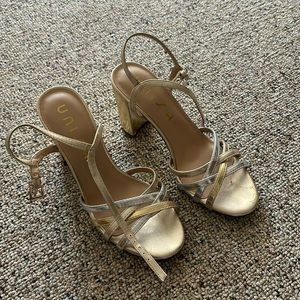 Gold high heels from unisa